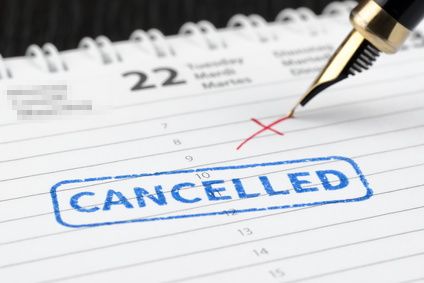 Seal cancelled stamped on paper planner - scheduling affects your bottom line