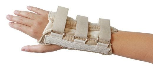 Hand with wrist support isolated on white